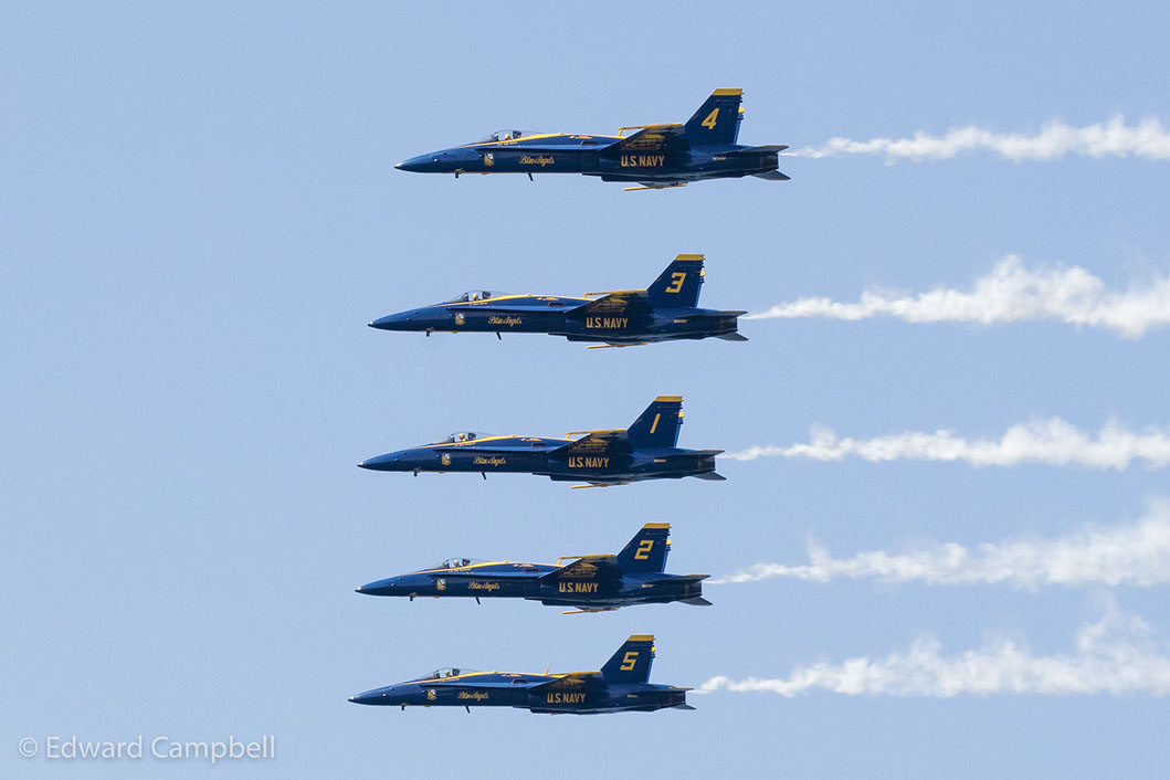 Blue Angels 1-5 complete the line abreast loop during the U.S. Navy Blue Angels performance at the 2016 Cleveland National Air Show.